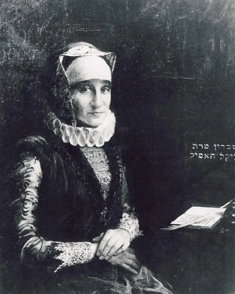 A painted portrait of a woman in seventeenth-century dress with a white ruffled collar and lace cuffs, seated beside papers with a Hebrew-script inscription behind her